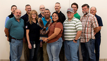 Members of the MnDOT Veterans EMployee Resource Group pose together.