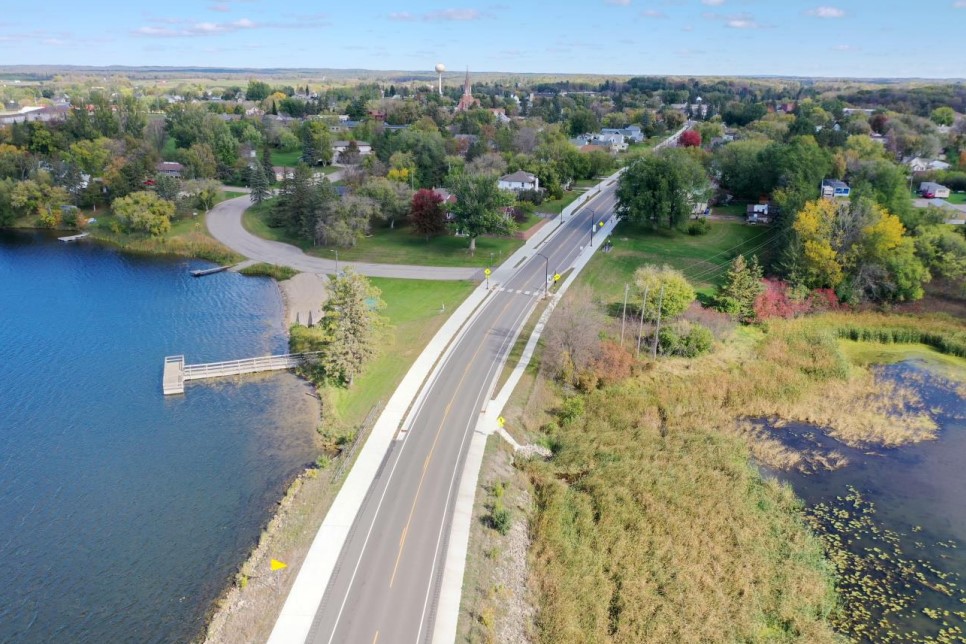 Highway 87 in downtown Frazee after construction: Narrower lanes, added bike lanes, improved crosswalks, and a new shared-use path.